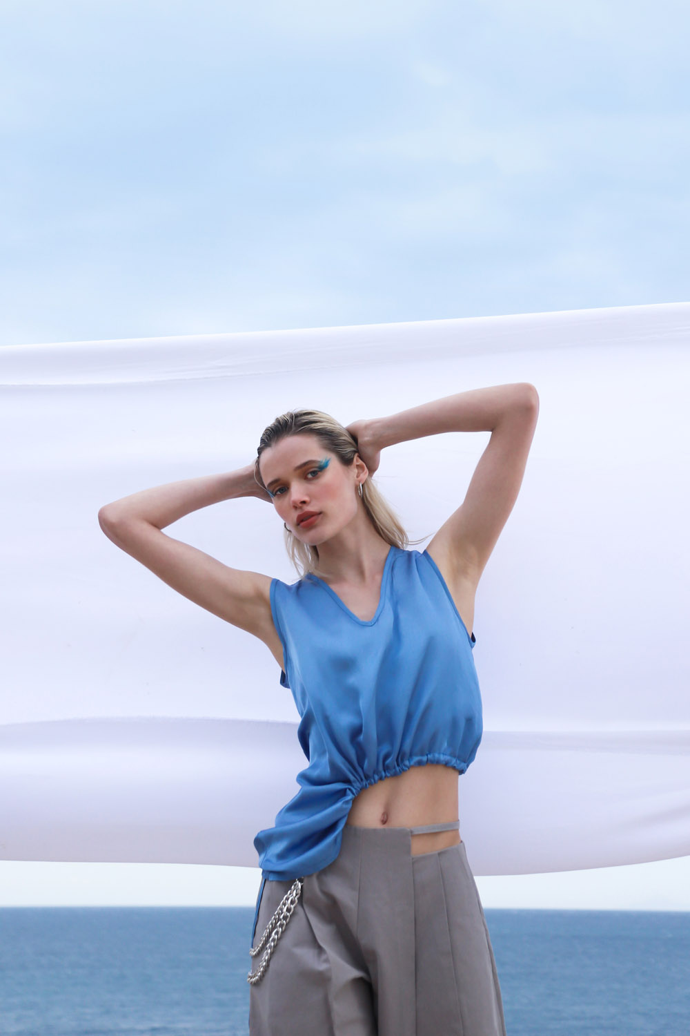 A00231_A00234_Front Sleeveless Cutout Top - Image 1